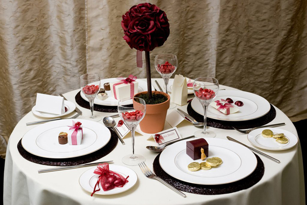 This photo shows a variety of wedding favours or table gifts in a Burgundy 